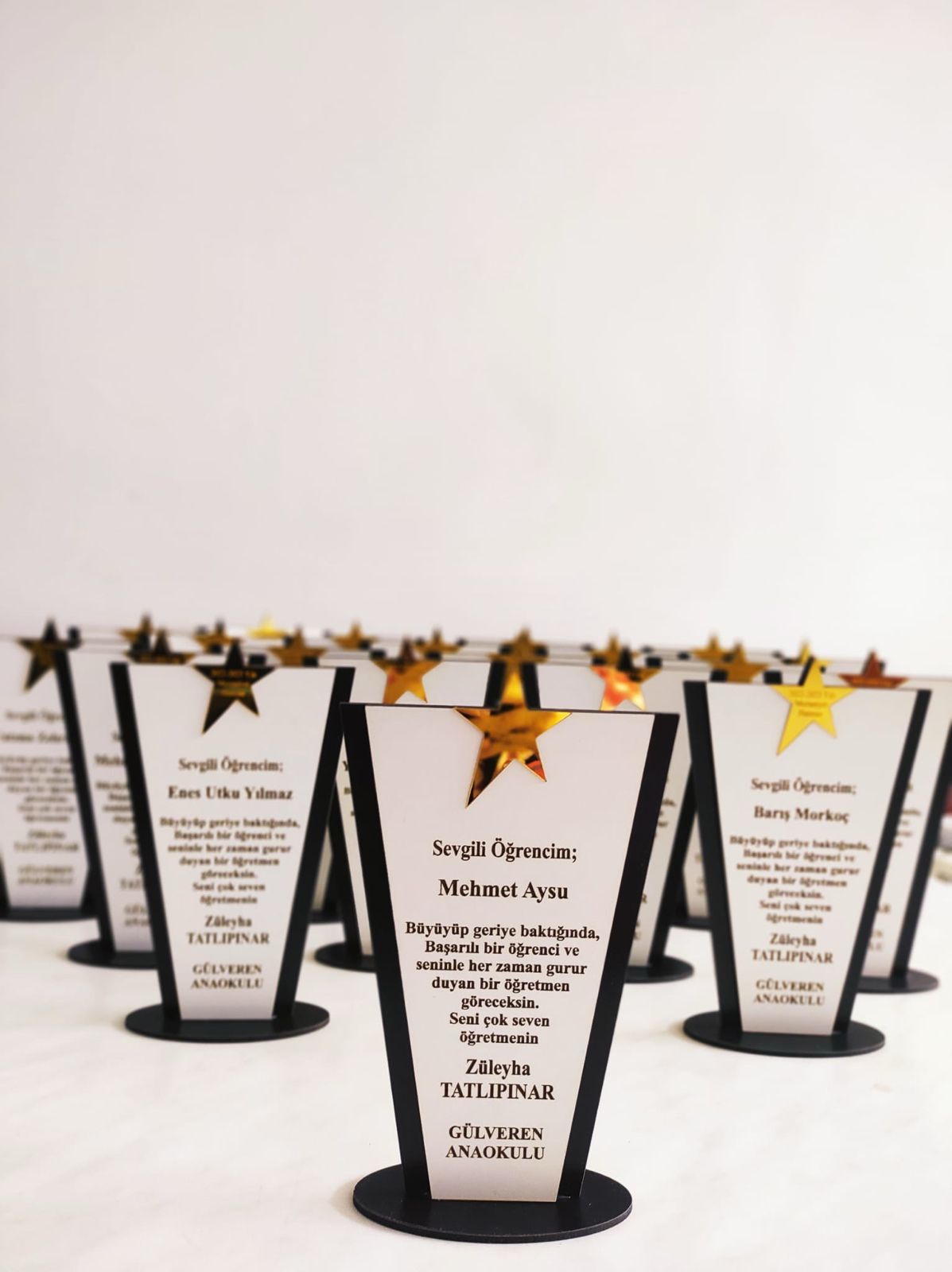 PLAKET